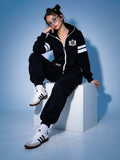 69 black jumpsuit, sitting: back stays covered | THE ONE