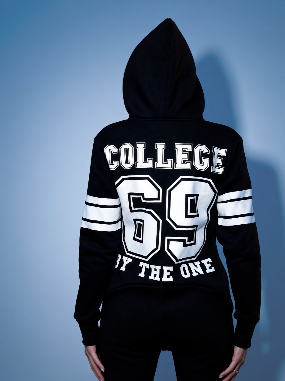 69 black jumpsuit, back view: hood and COLLEGE 69 print | THE ONE
