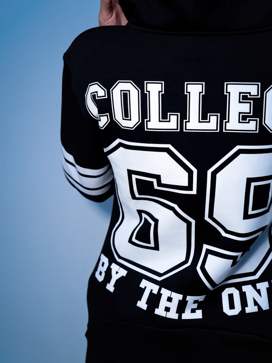 COLLEGE 69 BY THE ONE print on the back, close-up | THE ONE