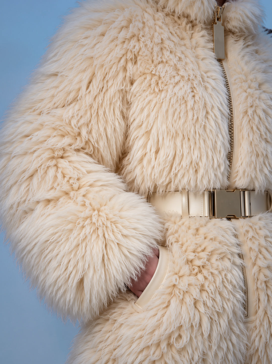 Everest faux fur jumpsuit, milk white — AI concept visualisation, not a photo of the finished piece