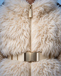 Everest faux fur jumpsuit, milk white — AI concept visualisation, not a photo of the finished piece