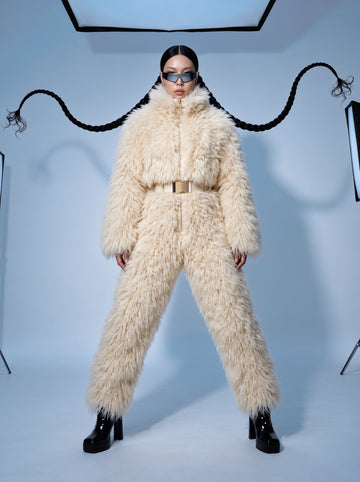 Everest faux fur jumpsuit, milk white — AI concept visualisation, not a photo of the finished piece