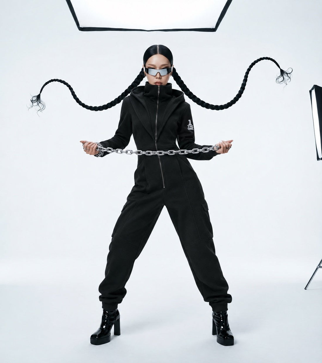 Ninja black jumpsuit in a dynamic pose: moves freely | THE ONE