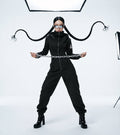 Ninja black jumpsuit, front view: hourglass silhouette, not baggy | THE ONE
