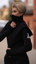 Ninja black jumpsuit, side view: fitted, not baggy | THE ONE