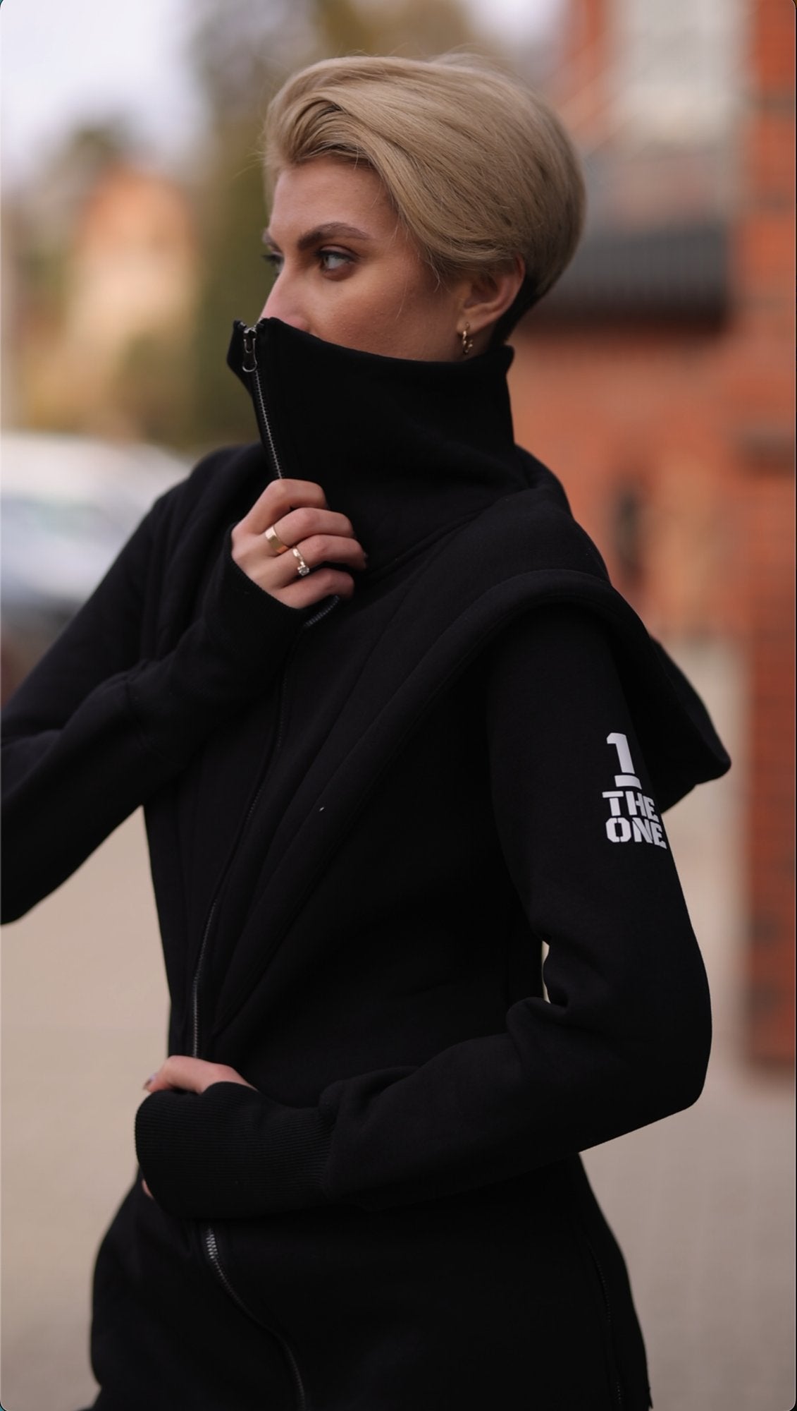Ninja black jumpsuit, side view: fitted, not baggy | THE ONE