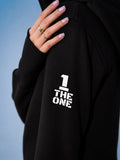 THE ONE logo on the sleeve of the Ninja black jumpsuit | THE ONE