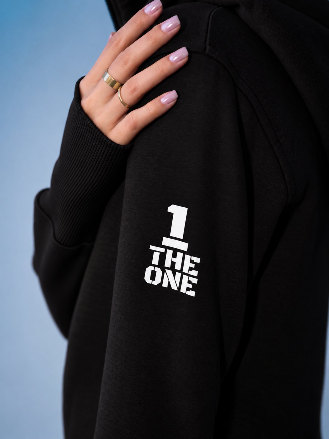 THE ONE logo on the sleeve of the Ninja black jumpsuit | THE ONE