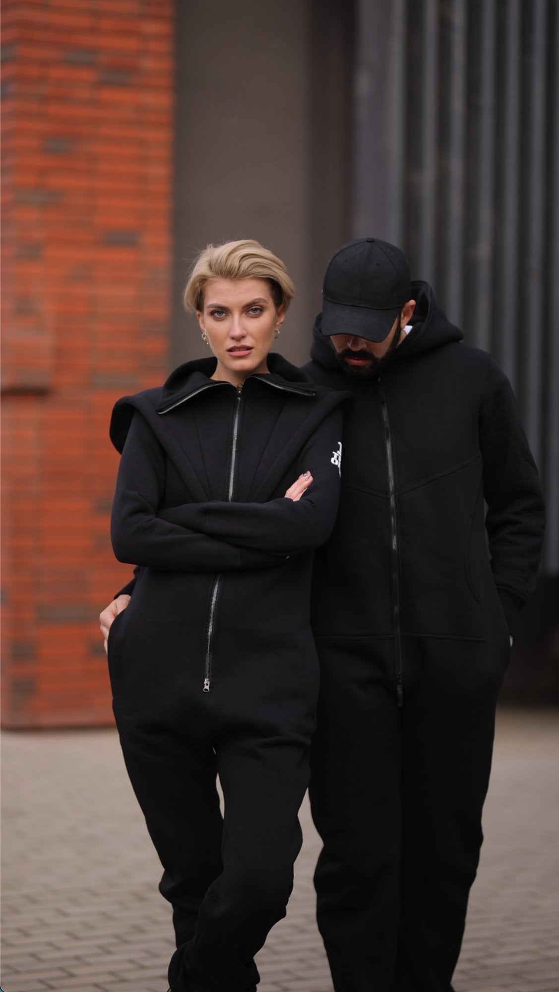 Couple in warm Ninja jumpsuits in black: family look | THE ONE