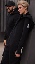 Couple in warm Ninja jumpsuits in black: family look | THE ONE