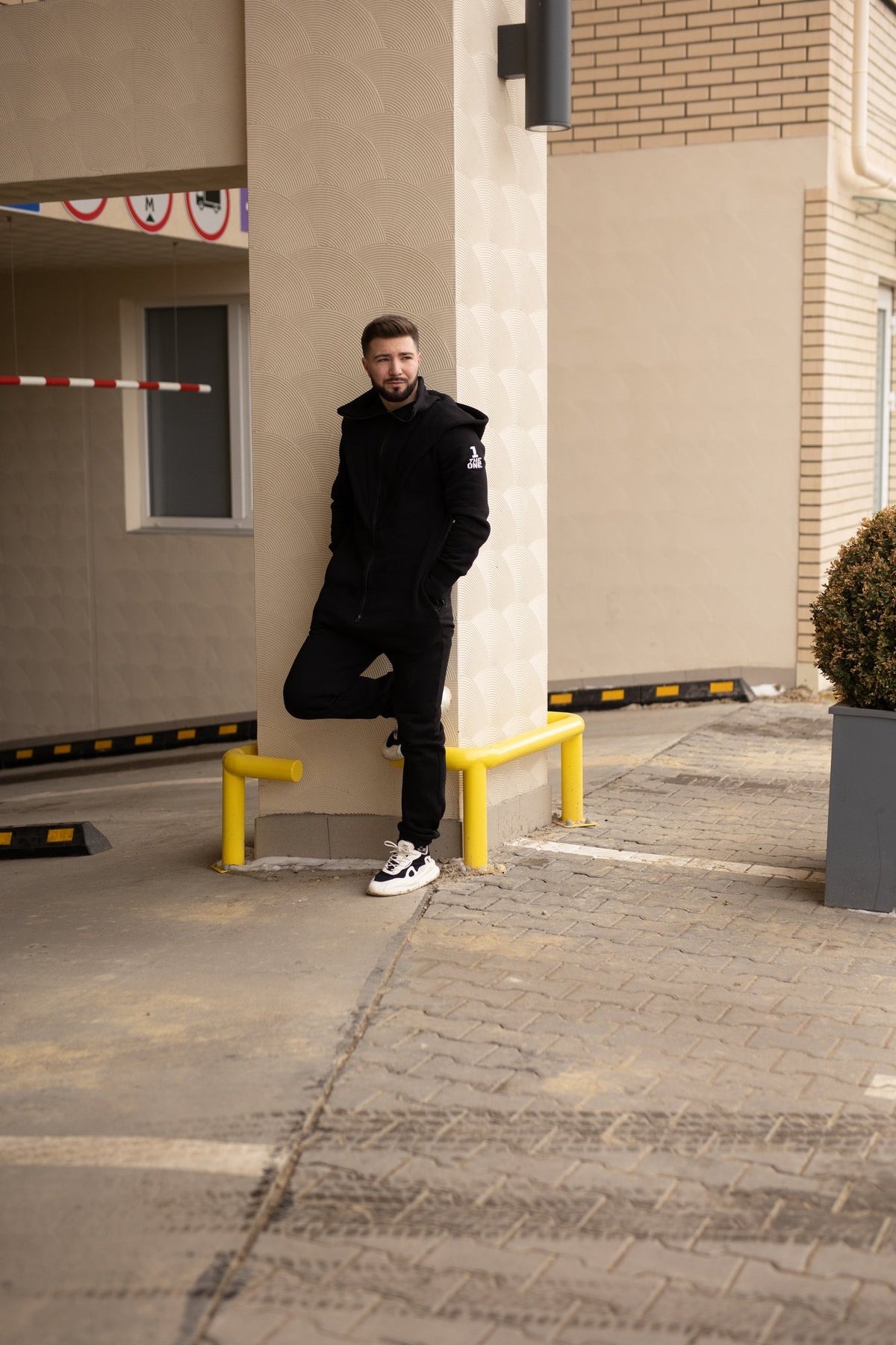 Men's warm jumpsuit Ninja black on a city street | THE ONE