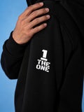 THE ONE logo on the sleeve of the Ninja black jumpsuit | THE ONE