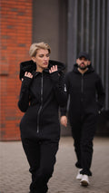Couple in warm Ninja jumpsuits in black: family look | THE ONE