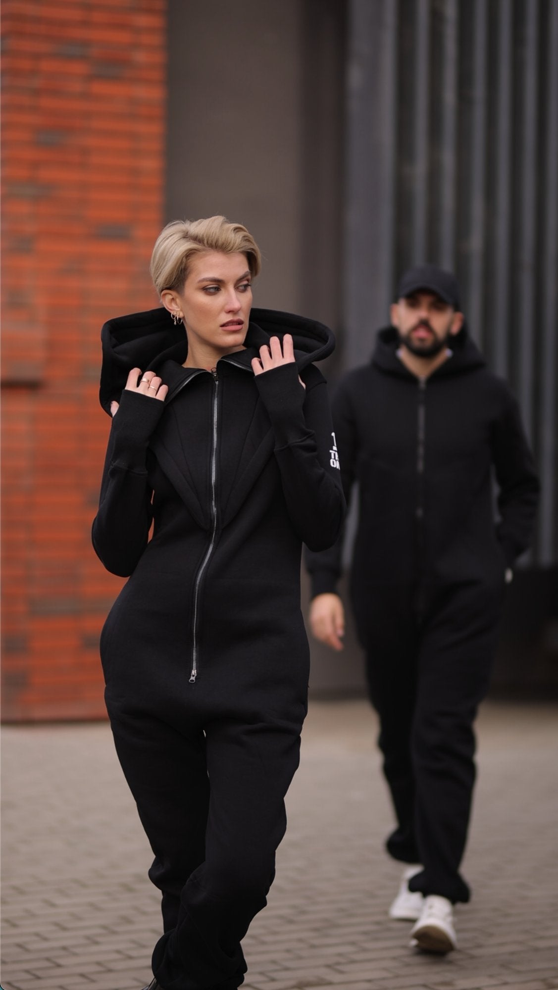 Couple in warm Ninja jumpsuits in black: family look | THE ONE