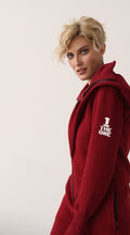 THE ONE logo on the sleeve of the Ninja wine jumpsuit | THE ONE