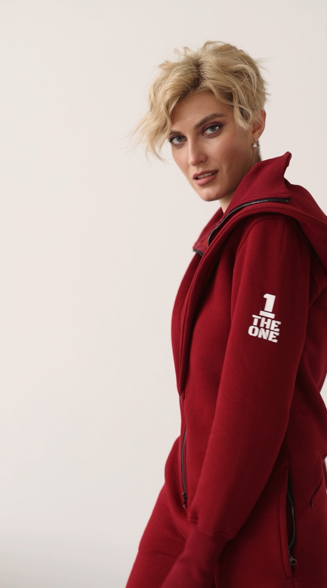 THE ONE logo on the sleeve of the Ninja wine jumpsuit | THE ONE