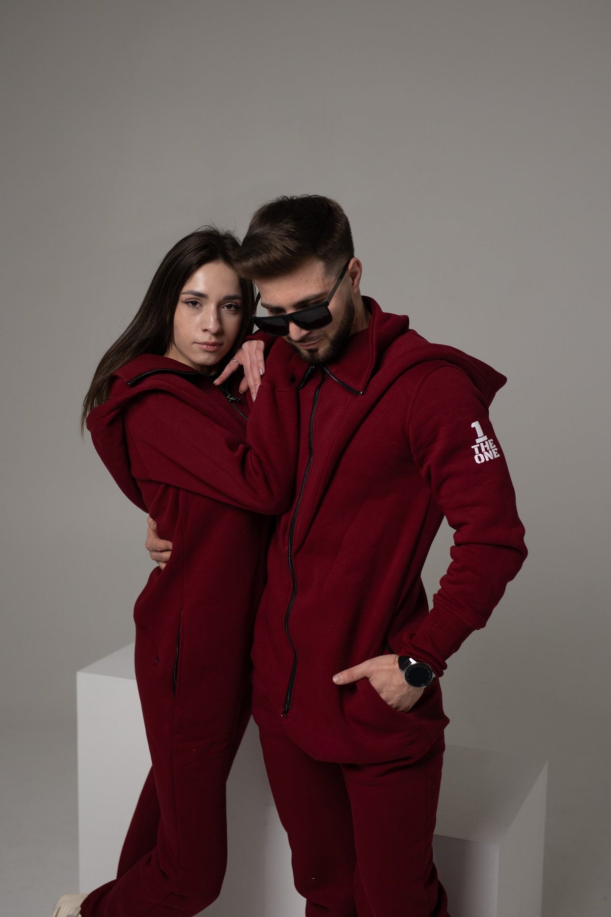 Couple in warm Ninja jumpsuits in wine: family look | THE ONE