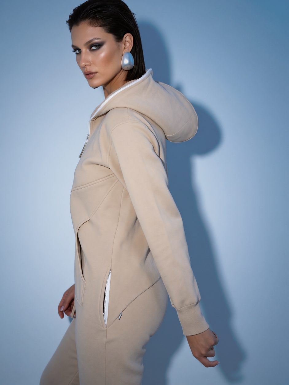 Original beige jumpsuit, side view: minimalist silhouette without patches | THE ONE