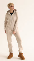 Original beige jumpsuit, front view: minimalist and soft | THE ONE