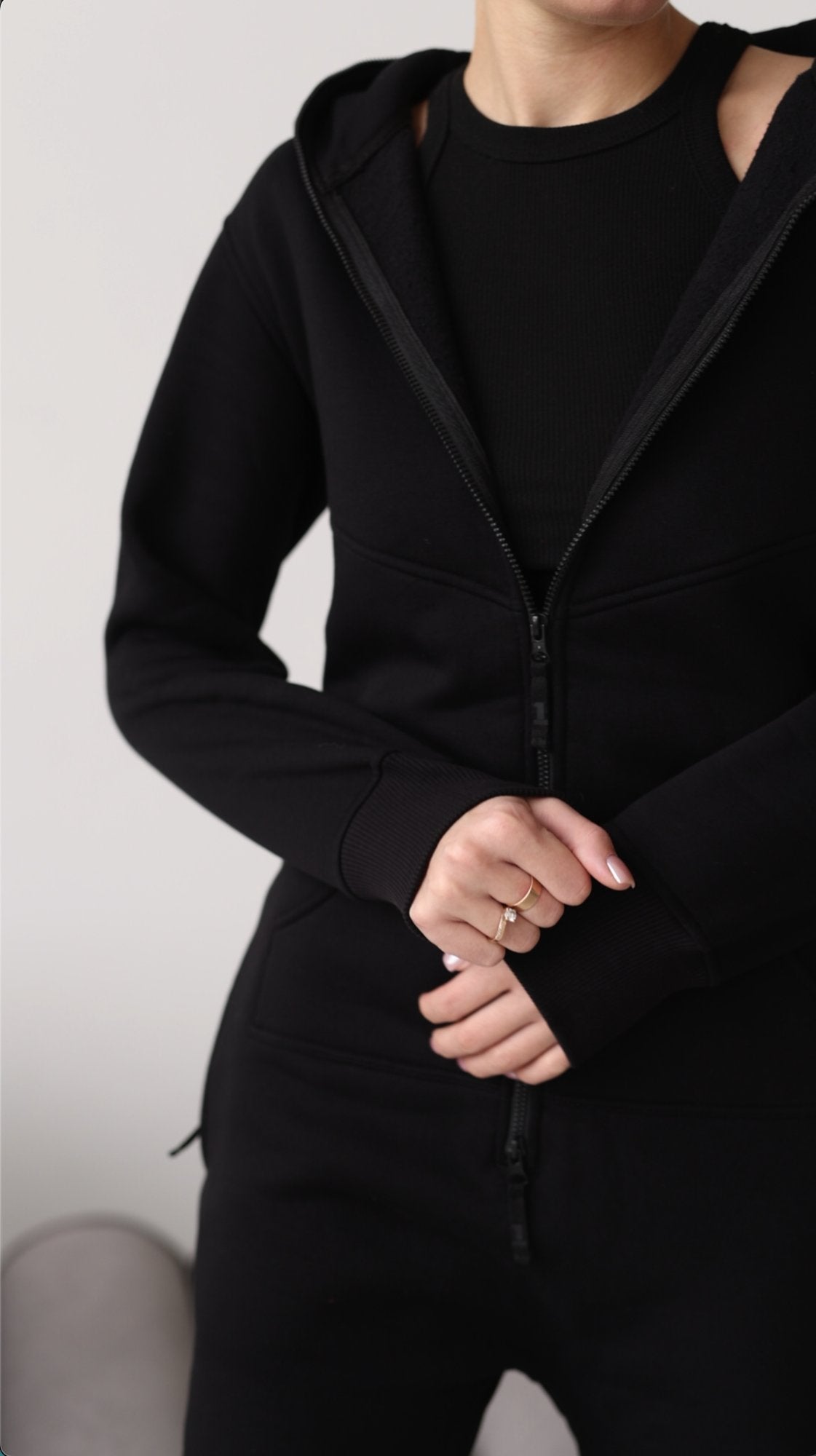 Original black jumpsuit unzipped: soft fleece inside | THE ONE