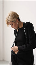 Original black jumpsuit with THE ONE zipper pull | THE ONE