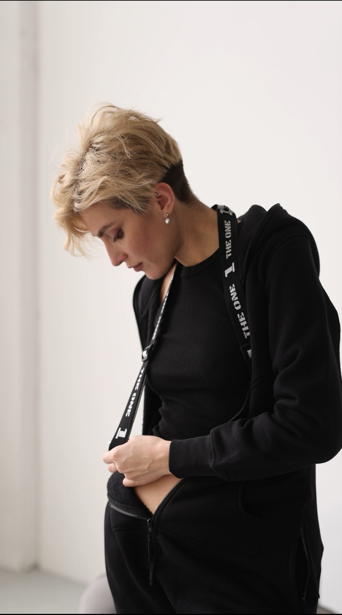 Original black jumpsuit with THE ONE zipper pull | THE ONE