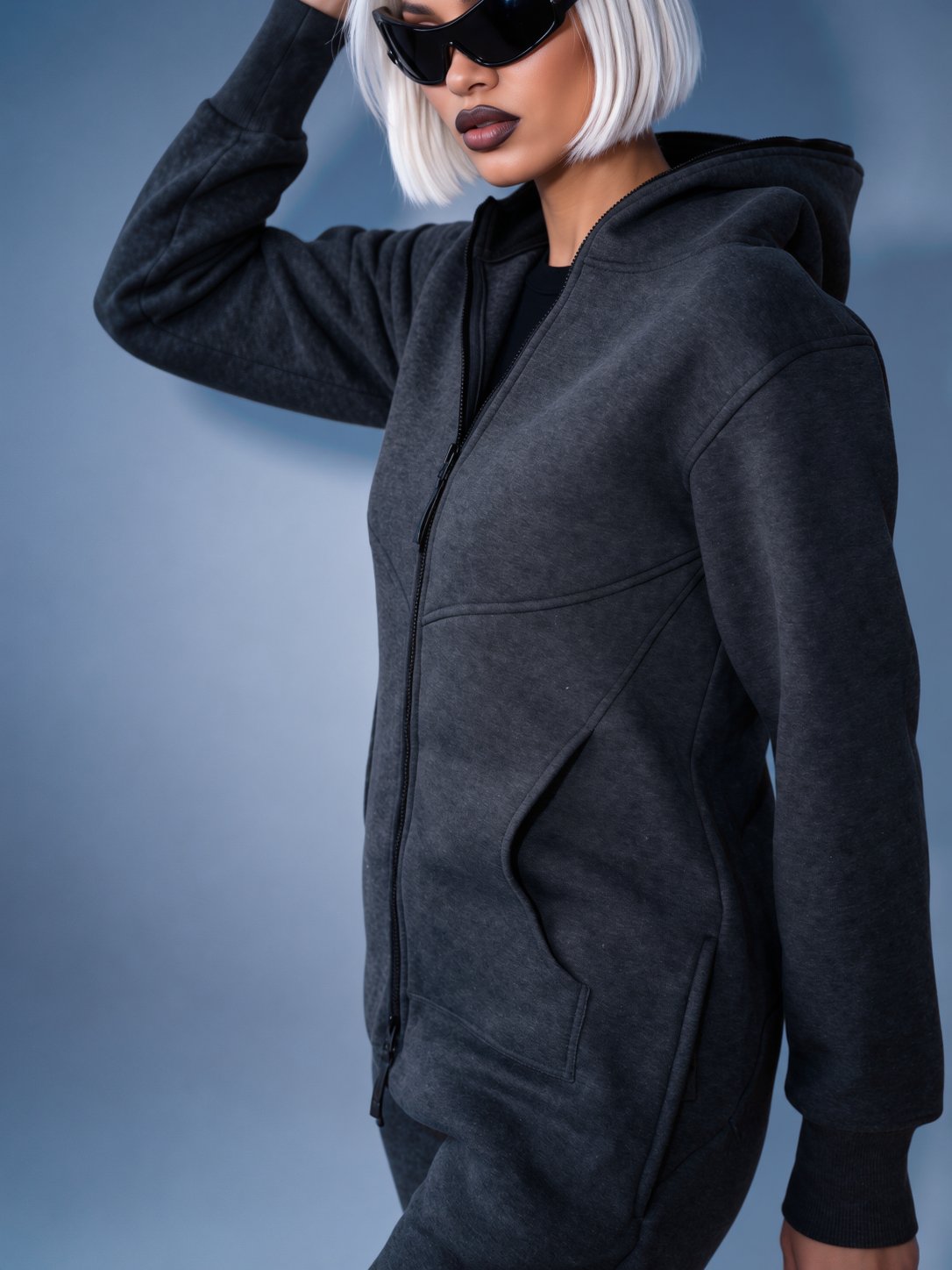 Original graphite jumpsuit with hood, side view: hourglass silhouette | THE ONE