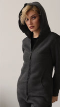 Original graphite jumpsuit with hood on, close-up | THE ONE