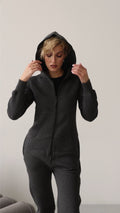 Putting on the hood of the Original graphite jumpsuit | THE ONE