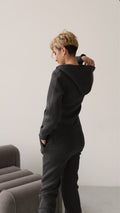 Original graphite jumpsuit, back view: lower back covered | THE ONE