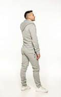 Original grey jumpsuit, back view: one-piece cut, back covered | THE ONE