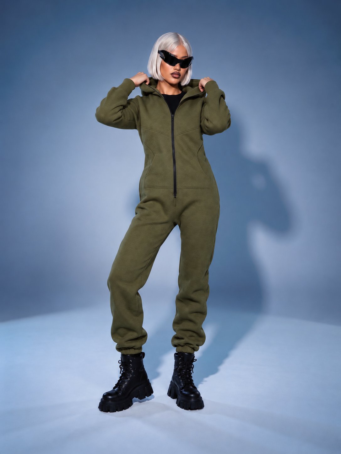 Women's warm fleece-lined jumpsuit Original khaki, full length, hands on the hood | THE ONE