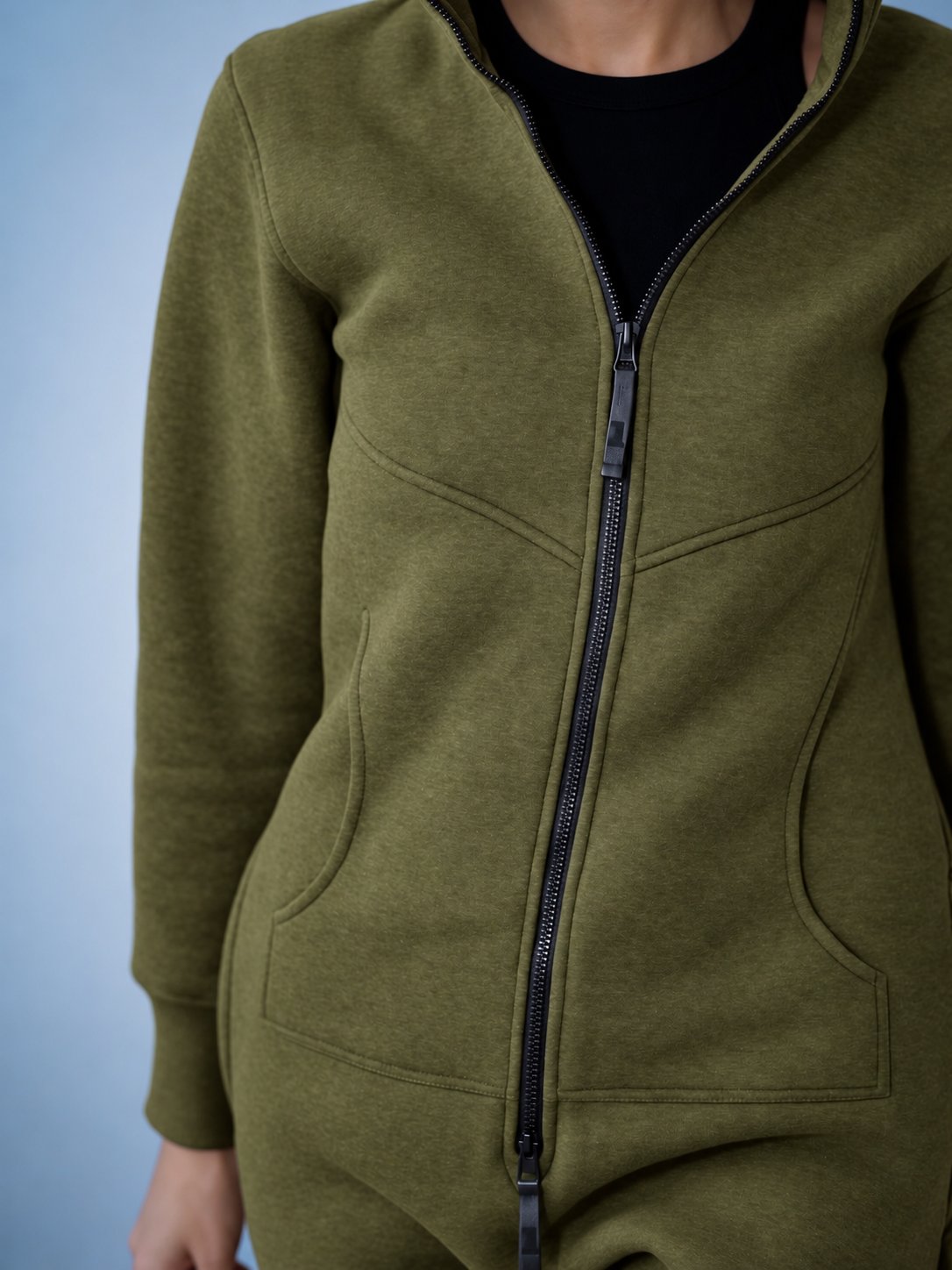 Original khaki jumpsuit close-up: dense knit and full-length zipper | THE ONE