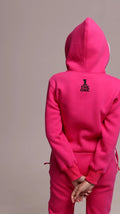 Original pink jumpsuit, back view: THE ONE print on the hood | THE ONE