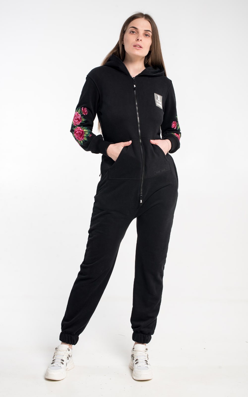 Skull and Roses black jumpsuit on a woman: roses on the sleeves, fits the figure | THE ONE